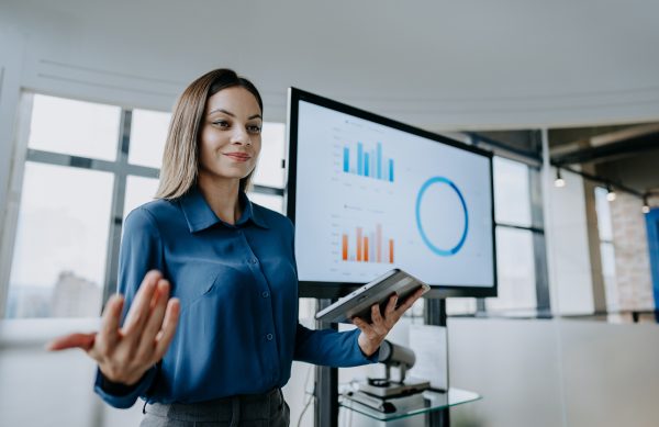 Businesswoman presenting financial result